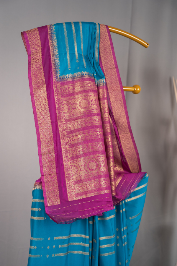 2D Pattern Semi Mysore Silk Crape With Golden Line All Over The Body - Sky Blue with Dark Pink - Image 2